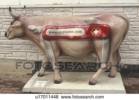 Stock Photo -  swiss cow, New Glarus, WI, Wisconsin, Little Switzerland, Painted swiss cow in the town of New Glarus.. Fotosearch