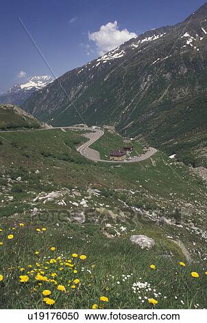 Switzerland, Alps, St. Gotthard Pass Road, Uri, Mountain road switchbacks it's way through the Saint Gotthard Mountain Pass in the scenic Swiss Alps. View Large Photo Image Stock Image - Switzerland, Alps, St. Gotthard Pass Road, Uri, Mountain road switchbacks it's way through the Saint Gotthard Mountain Pass in the scenic Swiss Alps.. Fotosearch