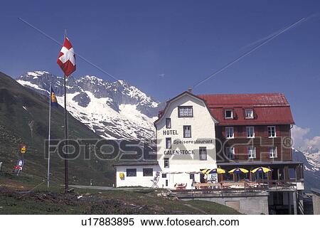 Switzerland, Alps, Uri, Furka Pass, Hotel-Restaurant in the snow along the Furka Mountain Pass Road in the Swiss Alps in the summer. View Large Photo Image Stock Photography - Switzerland, Alps, Uri, Furka Pass, Hotel-Restaurant in the snow along the Furka Mountain Pass Road in the Swiss Alps in the summer.. Fotosearch