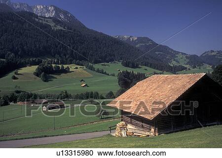 Switzerland, Berne, Bern, Scenic view of the farmland in the Simmental Valley in the Bernese Oberland. View Large Photo Image Stock Image - Switzerland, Berne, Bern, Scenic view of the farmland in the Simmental Valley in the Bernese Oberland.. Fotosearch