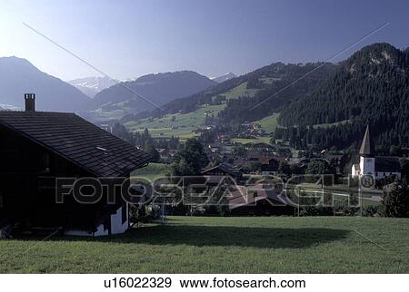 Switzerland, Berne, Bern, Scenic view of the village of Saanen in the Bernese Oberland. View Large Photo Image Stock Photo - Switzerland, Berne, Bern, Scenic view of the village of Saanen in the Bernese Oberland.. Fotosearch