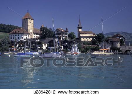 Switzerland, Berne, Bern, Thunersee, Boats buoyed in the harbor of Lake Thun in the town of Spiez in the Bernese Oberland. View Large Photo Image Stock Image - Switzerland, Berne, Bern, Thunersee, Boats buoyed in the harbor of Lake Thun in the town of Spiez in the Bernese Oberland.. Fotosearch