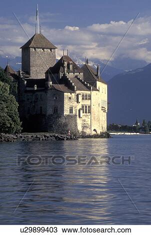 Switzerland, Chateau de Chillon, Montreux, Lake Geneva, Vaud, Scenic view of Chateau de Chillon an 13th century fortress surrounded by the Alps along the lakeshore of Lac Leman in the Canton of Vaud. View Large Photo Image Stock Image - Switzerland, Chateau de Chillon, Montreux, Lake Geneva, Vaud, Scenic view of Chateau de Chillon an 13th century fortress surrounded by the Alps along the lakeshore of Lac Leman in the Canton of Vaud. . Fotosearch