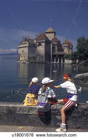 Stock Photo -  Switzerland, chateau, Montreux, Lake Geneva, Vaud, School children on a field trip at Chateau de Chillon along the lakeshore of Lac Leman in the Canton of Vaud. . Fotosearch