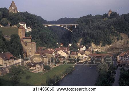 Stock Image -  Switzerland, Fribourg, Aerial view of the city of Fribourg and the Saane River., . Fotosearch
