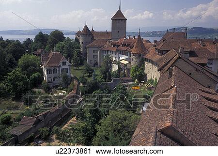 Stock Image -  Switzerland, Fribourg, Aerial view of the rooftops of the medieval ramparts surrounding the town of Murten/Morat . Fotosearch