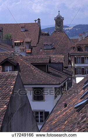 Stock Photograph -  Switzerland, Fribourg, Aerial view of the rooftops of the medieval ramparts surrounding the town of Murten/Morat . Fotosearch