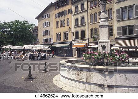 Switzerland, Geneva, Fountain and outdoor cafT at Place du Bourg de Four in the old town of the city of Geneva View Large Photo Image Picture - Switzerland, Geneva, Fountain and outdoor cafT at Place du Bourg de Four in the old town of the city of Geneva . Fotosearch