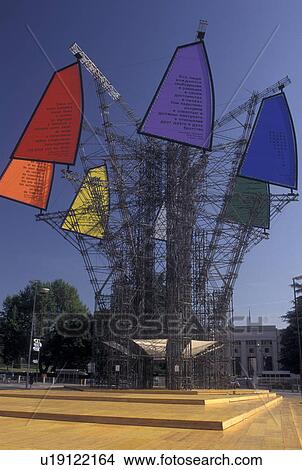 Switzerland, Geneva, UN, Monument with colorful flags represents the 50th Anniversary of the United Nations in the city of Geneva. View Large Photo Image Picture - Switzerland, Geneva, UN, Monument with colorful flags represents the 50th Anniversary of the United Nations in the city of Geneva.. Fotosearch