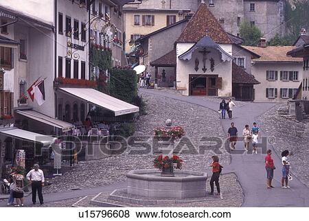 Switzerland, Gruyeres, Fribourg, Cobblestone pedestrian street in the fortified medieval village of Gruyeres in the Canton of Fribourg. View Large Photo Image Stock Photo - Switzerland, Gruyeres, Fribourg, Cobblestone pedestrian street in the fortified medieval village of Gruyeres in the Canton of Fribourg.. Fotosearch