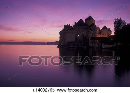 Switzerland, Lake Geneva, Chateau de Chillon, sunset, Montreux, Vaud, Silhouette of Chateau de Chillon an 13th century fortress at sunset along the lakeshore of Lac Leman in the Canton of Vaud. View Large Photo Image Stock Photography - Switzerland, Lake Geneva, Chateau de Chillon, sunset, Montreux, Vaud, Silhouette of Chateau de Chillon an 13th century fortress at sunset along the lakeshore of Lac Leman in the Canton of Vaud. . Fotosearch