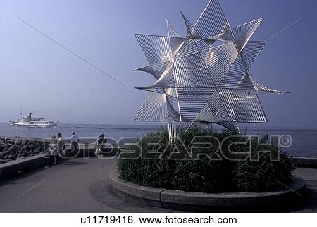 Switzerland, Lausanne, Ouchy, Vaud, Lac Leman, metal modern sculpture, excursion boat, lakefront park, Lake Geneva. View Large Photo Image Stock Photograph - Switzerland, Lausanne, Ouchy, Vaud, Lac Leman, metal modern sculpture, excursion boat, lakefront park, Lake Geneva.. Fotosearch
