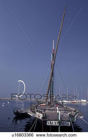 Switzerland, Lausanne, Ouchy, Vaud, Lac Leman, Old sailboat docked in the harbor of Lake Geneva. View Large Photo Image Stock Photograph - Switzerland, Lausanne, Ouchy, Vaud, Lac Leman, Old sailboat docked in the harbor of Lake Geneva. . Fotosearch