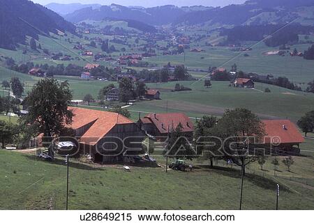Switzerland, Lucerne, Schupfheim, Entlebach Valley, Europe, Scenic view of chalets and the village of Schupfheim in the Entlebach Valley. View Large Photo Image Stock Photography - Switzerland, Lucerne, Schupfheim, Entlebach Valley, Europe, Scenic view of chalets and the village of Schupfheim in the Entlebach Valley.. Fotosearch