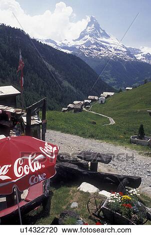 Switzerland, Matterhorn, Cervin, Valais, Alps, Findeln, Scenic view the Matterhorn from an outdoor cafT in the mountain village of Findeln above Zermatt in the Swiss Alps. View Large Photo Image Stock Image - Switzerland, Matterhorn, Cervin, Valais, Alps, Findeln, Scenic view the Matterhorn from an outdoor cafT in the mountain village of Findeln above Zermatt in the Swiss Alps.. Fotosearch