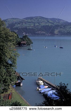 Switzerland, Spiez, Berne, Bern, Thunersee, Scenic view of Lake Thun in the Bernese Oberland. View Large Photo Image Stock Photography - Switzerland, Spiez, Berne, Bern, Thunersee, Scenic view of Lake Thun in the Bernese Oberland.. Fotosearch