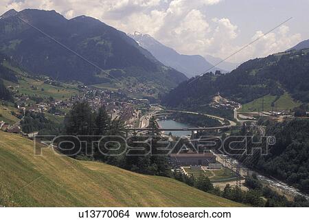 Switzerland, Ticino, Airolo, Val Leventina, St. Gotthard Pass, Alps, Entrance to the Saint Gotthard Mountain Pass in the scenic Swiss Alps. View Large Photo Image Picture - Switzerland, Ticino, Airolo, Val Leventina, St. Gotthard Pass, Alps, Entrance to the Saint Gotthard Mountain Pass in the scenic Swiss Alps.. Fotosearch