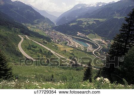 Switzerland, Ticino, Airolo, Val Leventina, Alps, St. Gotthard Pass Road, Mountain road switchbacks it's way through the Saint Gotthard Mountain Pass in the scenic Swiss Alps. View Large Photo Image Picture - Switzerland, Ticino, Airolo, Val Leventina, Alps, St. Gotthard Pass Road, Mountain road switchbacks it's way through the Saint Gotthard Mountain Pass in the scenic Swiss Alps.. Fotosearch