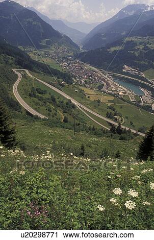 Switzerland, Ticino, Airolo, Val Leventina, St. Gotthard Pass Road, Alps, Mountain road switchbacks it's way through the Saint Gotthard Mountain Pass in the scenic Swiss Alps. View Large Photo Image Stock Image - Switzerland, Ticino, Airolo, Val Leventina, St. Gotthard Pass Road, Alps, Mountain road switchbacks it's way through the Saint Gotthard Mountain Pass in the scenic Swiss Alps.. Fotosearch