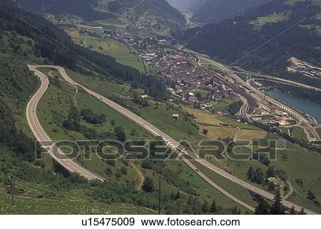 Switzerland, Ticino, Airolo, Val Leventina, St. Gotthard Pass Road, Alps, Mountain road switchbacks it's way through the Saint Gotthard Mountain Pass in the scenic Swiss Alps. View Large Photo Image Stock Photo - Switzerland, Ticino, Airolo, Val Leventina, St. Gotthard Pass Road, Alps, Mountain road switchbacks it's way through the Saint Gotthard Mountain Pass in the scenic Swiss Alps.. Fotosearch