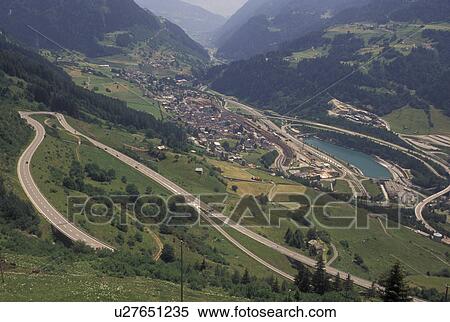 Switzerland, Ticino, Airolo, Val Leventina, St. Gotthard Pass Road, Alps, Mountain road switchbacks it's way through the Saint Gotthard Mountain Pass in the scenic Swiss Alps. View Large Photo Image Stock Photography - Switzerland, Ticino, Airolo, Val Leventina, St. Gotthard Pass Road, Alps, Mountain road switchbacks it's way through the Saint Gotthard Mountain Pass in the scenic Swiss Alps.. Fotosearch