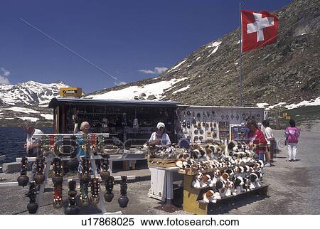 Switzerland, Ticino, Alps, Saint Gotthard Pass Road, Souvenirs of Switzerland on display, for sale, on the summit of St. Gotthard Mountain Pass in the scenic Swiss Alps in the summer. View Large Photo Image Stock Photography - Switzerland, Ticino, Alps, Saint Gotthard Pass Road, Souvenirs of Switzerland on display, for sale, on the summit of St. Gotthard Mountain Pass in the scenic Swiss Alps in the summer.. Fotosearch