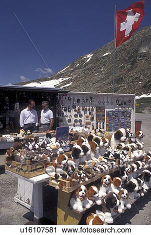 Switzerland, Ticino, Alps, St. Gotthard Pass Road, Souvenirs of Switzerland on display, for sale, on the summit of Saint Gotthard Mountain Pass in the scenic Swiss Alps in the summer. View Large Photo Image Stock Image - Switzerland, Ticino, Alps, St. Gotthard Pass Road, Souvenirs of Switzerland on display, for sale, on the summit of Saint Gotthard Mountain Pass in the scenic Swiss Alps in the summer.. Fotosearch