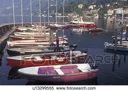 Switzerland, Ticino, Ascona, Boats docked in the harbor along the lakefront of Lake Maggiore in the city of Ascona. View Large Photo Image Stock Photography - Switzerland, Ticino, Ascona, Boats docked in the harbor along the lakefront of Lake Maggiore in the city of Ascona.. Fotosearch