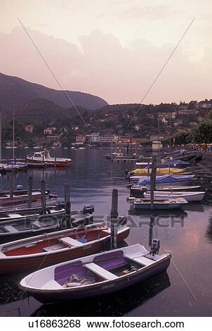Switzerland, Ticino, Ascona, Lake Maggiore, Boats docked in the harbor along the lakefront of Lake Maggiore in the city of Ascona. View Large Photo Image Stock Photo - Switzerland, Ticino, Ascona, Lake Maggiore, Boats docked in the harbor along the lakefront of Lake Maggiore in the city of Ascona.. Fotosearch