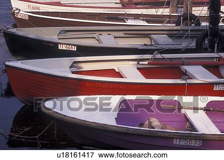 Switzerland, Ticino, Ascona, Rowboats docked in the harbor along the lakefront of Lake Maggiore in the city of Ascona. View Large Photo Image Stock Photo - Switzerland, Ticino, Ascona, Rowboats docked in the harbor along the lakefront of Lake Maggiore in the city of Ascona.. Fotosearch