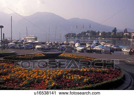 Switzerland, Ticino, Locarno, Lakefront park along Lake Maggiore in the city of Locarno. View Large Photo Image Stock Image - Switzerland, Ticino, Locarno, Lakefront park along Lake Maggiore in the city of Locarno.. Fotosearch