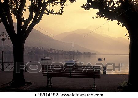 Switzerland, Ticino, Locarno, Lakefront park along Lake Maggiore in the city of Locarno. View Large Photo Image Stock Image - Switzerland, Ticino, Locarno, Lakefront park along Lake Maggiore in the city of Locarno.. Fotosearch