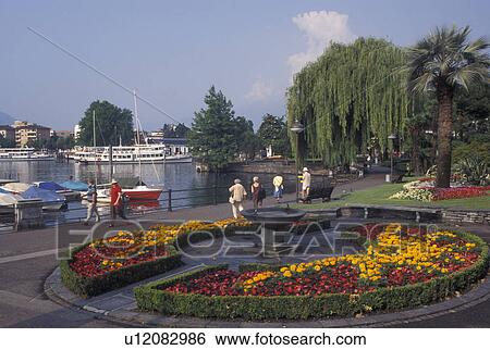 Stock Photograph -  Switzerland, Ticino, Locarno, Lakefront park along Lake Maggiore in the city of Locarno.. Fotosearch