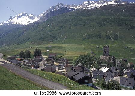 Switzerland, Uri, Urseren, Alps, Scenic view of the village of Hospental in the Swiss Alps. View Large Photo Image Stock Photograph - Switzerland, Uri, Urseren, Alps, Scenic view of the village of Hospental in the Swiss Alps.. Fotosearch