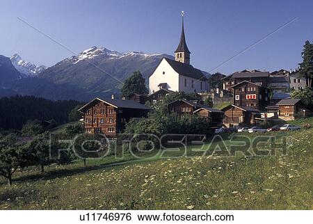 Switzerland, Valais, Alps, Picturesque village of Ernen in Goms Valley in the Canton of Valais in the Swiss Alps. View Large Photo Image Stock Photograph - Switzerland, Valais, Alps, Picturesque village of Ernen in Goms Valley in the Canton of Valais in the Swiss Alps.. Fotosearch