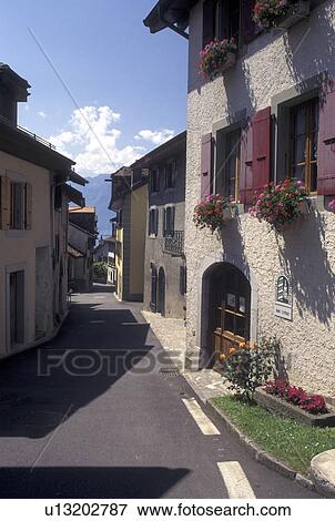Switzerland, Vaud, Lavaux, Lake Geneva, Alps, Picturesque wine village of Rivaz in the Canton of Vaud. View Large Photo Image Stock Photo - Switzerland, Vaud, Lavaux, Lake Geneva, Alps, Picturesque wine village of Rivaz in the Canton of Vaud. . Fotosearch