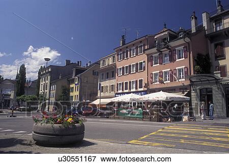 Stock Photo -  Switzerland, Vevey, Vaud, Buildings along the street in downtown Vevey in the Canton of Vaud. . Fotosearch