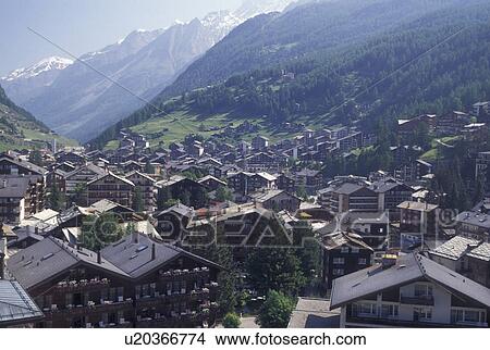 Picture -  Switzerland, Zermatt, Valais, Alps, Aerial view of the mountain resort village of Zermatt in the Swiss Alps.. Fotosearch