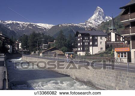 Switzerland, Zermatt, Valais, Alps, River flows rapidly through the mountain resort village of Zermatt with a view of the Matterhorn in the Swiss Alps. View Large Photo Image Stock Image - Switzerland, Zermatt, Valais, Alps, River flows rapidly through the mountain resort village of Zermatt with a view of the Matterhorn in the Swiss Alps.. Fotosearch