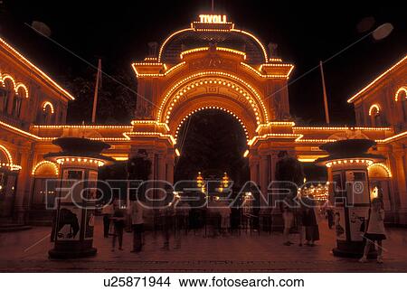 Tivoli Gardens, Copenhagen, Denmark, Scandinavia, Sjaelland, Europe, Entrance to Tivoli Amusement Park illuminated at night. View Large Photo Image Picture - Tivoli Gardens, Copenhagen, Denmark, Scandinavia, Sjaelland, Europe, Entrance to Tivoli Amusement Park illuminated at night.. Fotosearch