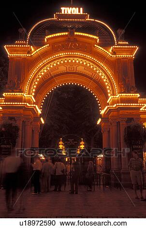 Tivoli Gardens, Copenhagen, Denmark, Scandinavia, Sjaelland, Europe, Entrance to Tivoli Amusement Park illuminated at night. View Large Photo Image Stock Image - Tivoli Gardens, Copenhagen, Denmark, Scandinavia, Sjaelland, Europe, Entrance to Tivoli Amusement Park illuminated at night.. Fotosearch