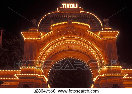 Tivoli Gardens, Copenhagen, Denmark, Scandinavia, Sjaelland, Europe, Entrance to Tivoli Amusement Park illuminated at night. View Large Photo Image Stock Photo - Tivoli Gardens, Copenhagen, Denmark, Scandinavia, Sjaelland, Europe, Entrance to Tivoli Amusement Park illuminated at night.. Fotosearch