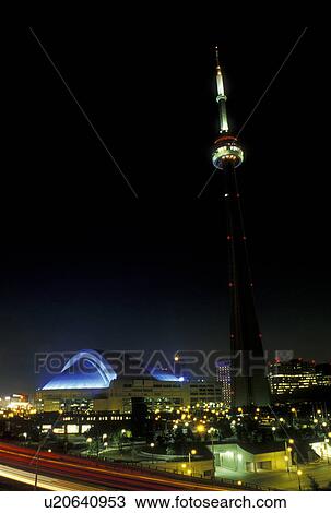 Stock Image -  Toronto, Canada, Ontario, CN Tower and Skydome in downtown Toronto in the evening.. Fotosearch