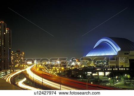 Toronto, Canada, Ontario, Skydome along Gardiner Expressway in downtown Toronto in the evening. View Large Photo Image Picture - Toronto, Canada, Ontario, Skydome along Gardiner Expressway in downtown Toronto in the evening.. Fotosearch