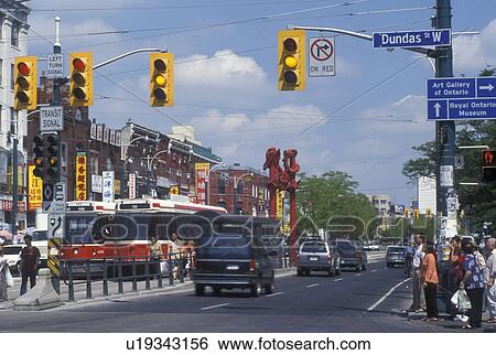 Stock Photograph -  Toronto, Canada, Ontario, Trolley runs along Spadina Avenue in Chinatown in downtown Toronto. . Fotosearch