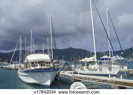 Tortola, British Virgin Islands, Road Town, Caribbean, BVI, Boats docked at a yacht club on the Caribbean Sea on the island of Tortola. View Large Photo Image Picture - Tortola, British Virgin Islands, Road Town, Caribbean, BVI, Boats docked at a yacht club on the Caribbean Sea on the island of Tortola.. Fotosearch