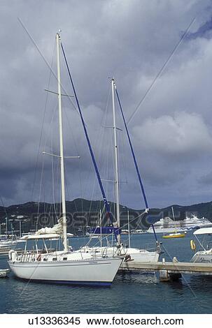 Tortola, British Virgin Islands, Road Town, Caribbean, BVI, Boats docked at a yacht club on the Caribbean Sea on the island of Tortola. View Large Photo Image Stock Photography - Tortola, British Virgin Islands, Road Town, Caribbean, BVI, Boats docked at a yacht club on the Caribbean Sea on the island of Tortola.. Fotosearch