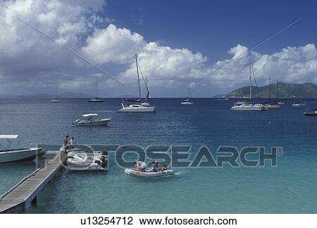 Tortola, British Virgin Islands, Caribbean, BVI, Cane Garden Bay on the island of Tortola on the Caribbean Sea. View Large Photo Image Stock Image - Tortola, British Virgin Islands, Caribbean, BVI, Cane Garden Bay on the island of Tortola on the Caribbean Sea.. Fotosearch