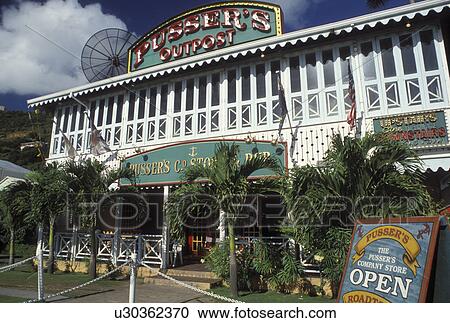 Stock Image -  Tortola, Pusser's Outpost, British Virgin Islands, Road Town, Caribbean, BVI, Pusser's Outpost Restaurant in Road Town on the island of Tortola.. Fotosearch