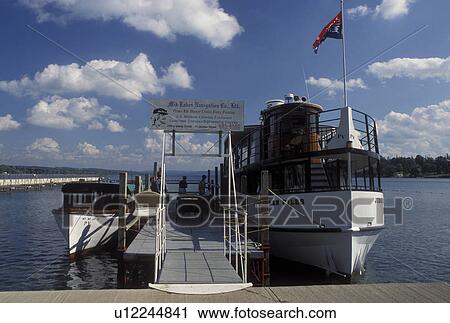 tour boat, Skaneateles, NY, New York, Skaneateles Lake, Finger Lakes, The Judge Ben Wiles sightseeing dinner cruise boat docked in the harbor of Skaneateles Lake in the Finger Lakes Region. View Large Photo Image Stock Image - tour boat, Skaneateles, NY, New York, Skaneateles Lake, Finger Lakes, The Judge Ben Wiles sightseeing dinner cruise boat docked in the harbor of Skaneateles Lake in the Finger Lakes Region.. Fotosearch